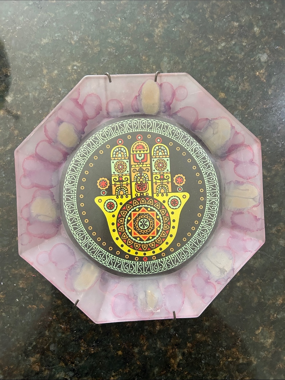 Purple glass plate with hamsa